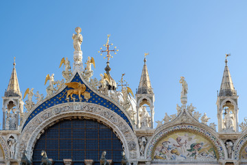 Architectural details from the upper part of facade of San Marco Basilica in Venice, Italy