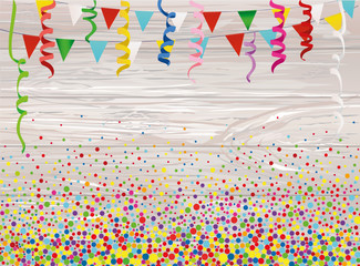 Obraz premium An empty invitation to a holiday in a heap of colorful confetti 