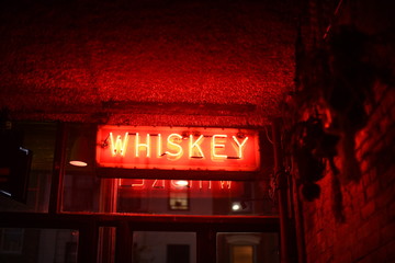 Neon whiskey bar sign