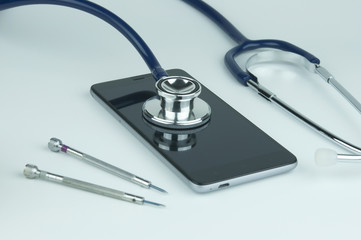 Stethoscope and smartphone.