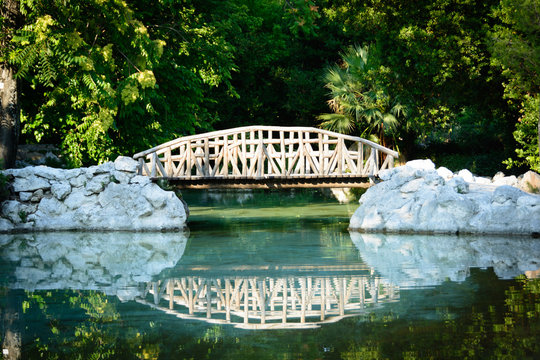  wooden bridge in the Athens National Garden , known as the Royal Garden , Greece 

