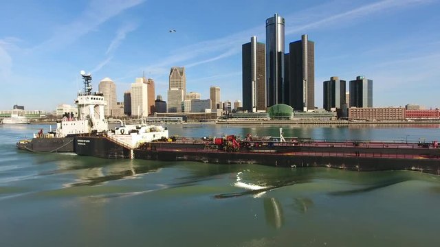Towards Barge Over Icy River With Downtown Detroit Skyline