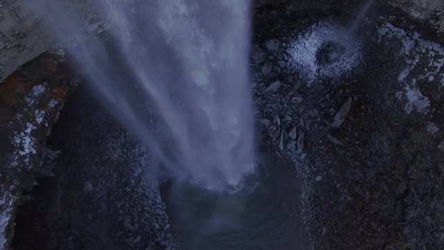 4k Aerial Snow Tennessee Waterfall Bird's Eye View 004 Close High Descent 