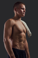 Fototapeta premium Healthy muscular young man. Sport portrait. Fitness body.