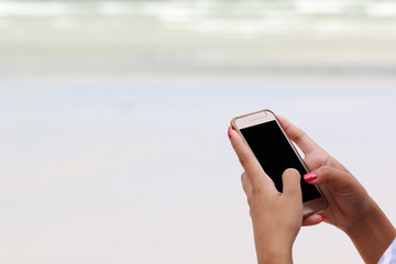 Woman Using smartphone with blank screen, Communication technology concept