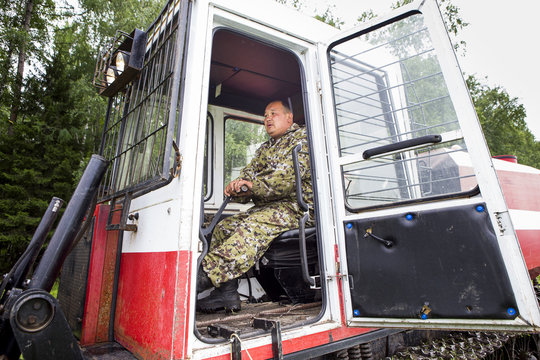Skidding tractor in the work process