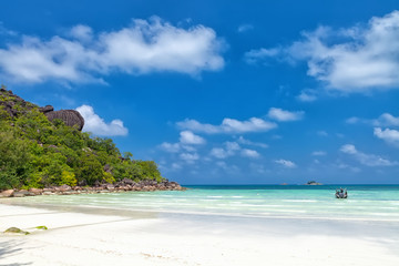 White coral sand on а tropical beach. Praslin island, Seychelles