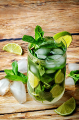 Mojito coctail  with fresh mint leaves and lime slice