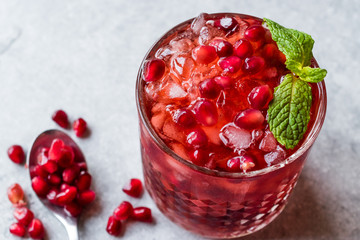 Pomegranate Cocktail with Mint Leaves and Crushed Ice.