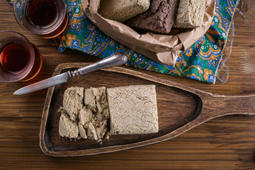 halva on a wooden board, oriental sweets