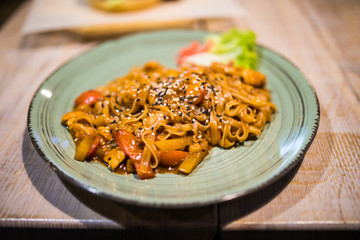 Pasta Fettuccine Bolognese with tomato sauce in white bowl. Flat lay.