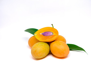 Fresh marian plum or Plango thai fruit isolated on white background (Mayongchid Maprang Marian Plum and Plum Mango,Thailand).
