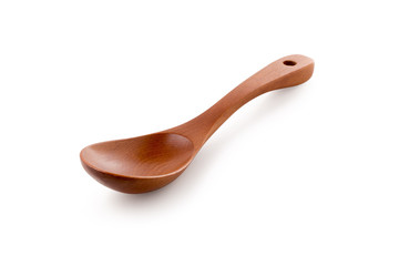 Wooden spoon isolated on a white background
