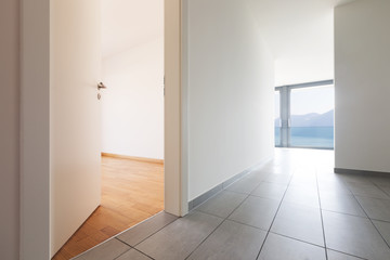 Interior of modern apartment, empty corridor