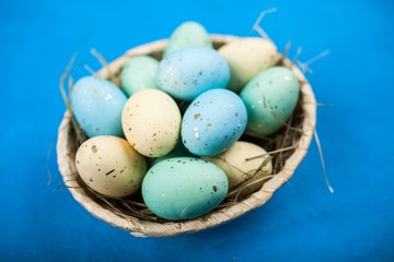Naklejka na ściany i meble Easter eggs on blue background