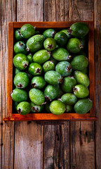 Feijoa Fruits. Fresh ripe sweet .Tropical fruit. Background of green color.Food or Healthy diet concept.Super Food.Vegetarian.Top View.Copy space for Text.selective focus.