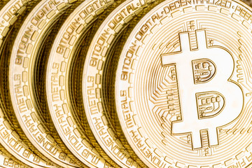 Macro view of a golden Bitcoin cryptocurrency
