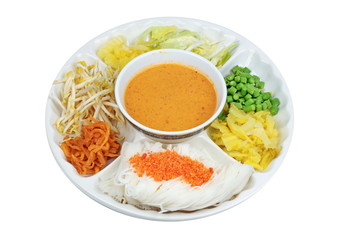 Rice noodle topped minced dried shrimp served with fish curry in coconut milk and herb.