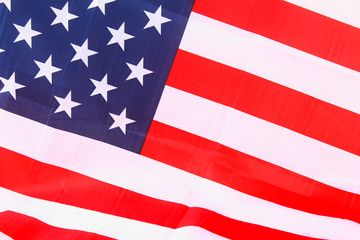 USA flag. American flag. American flag blowing wind. Close-up. Studio shot.