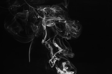 abstract of white smoke in dark background with smooth motion flowing.