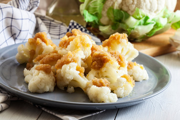 Vegetarian cooked cauliflower with bread crumb
