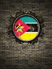 Old Republic of Mozambique flag in brick wall