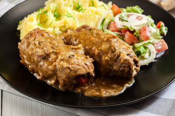 Pork rolls in sauce
