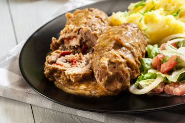 Pork rolls in sauce