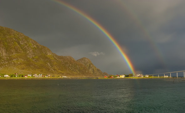 Rainbow at coastal fjords near Alesund, Norway
