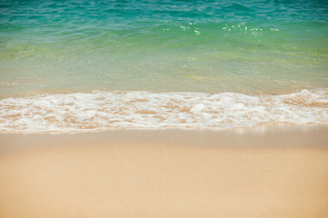 Fototapeta na wymiar Wave lapping on the shore
