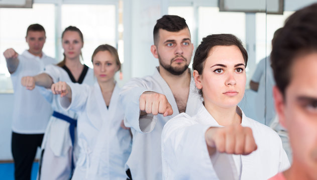 trainees expressing interest in attending karate class