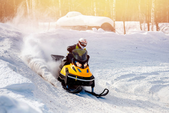 Snowmobile. Snowmobile races in snow. Concept winter sports, racers.