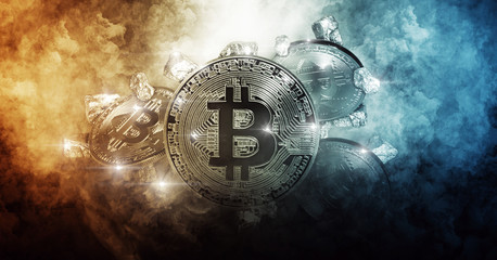 bitcoin coin and mound of gold nuggets