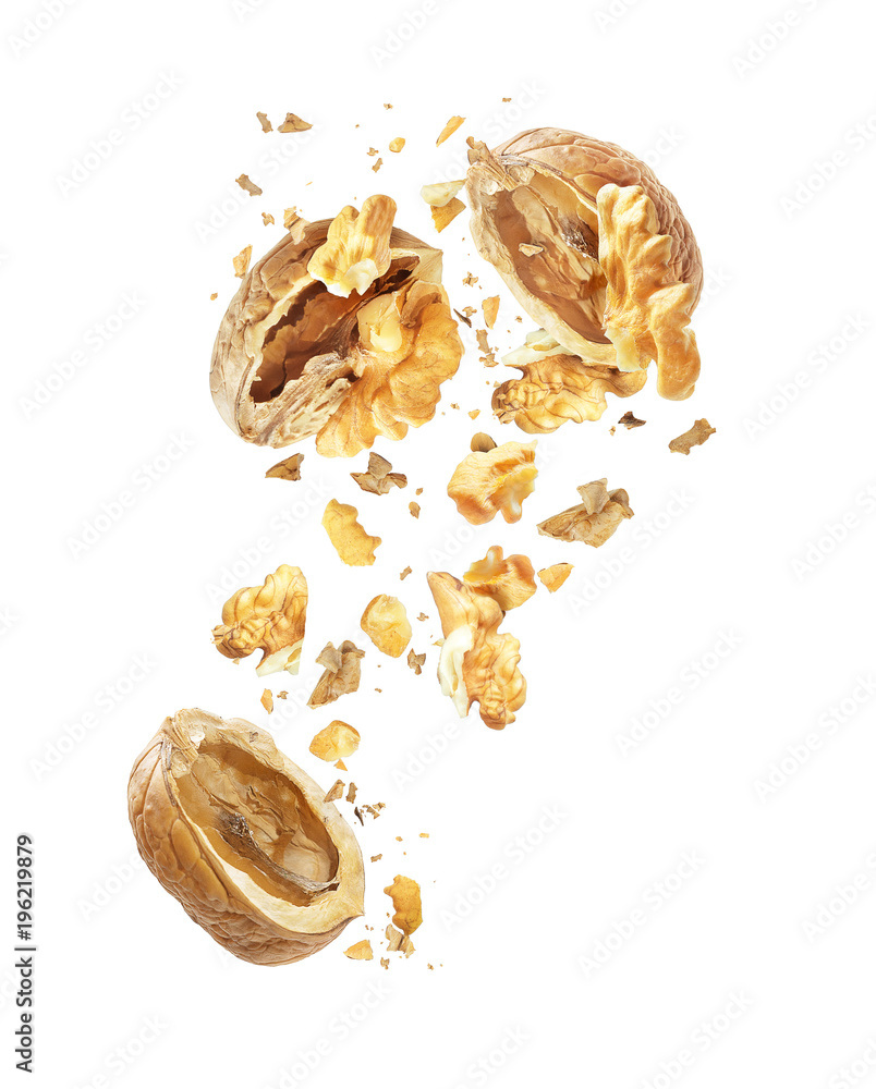Wall mural walnut is torn to pieces close-up, isolated on white background - Wall murals