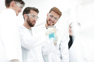 Fototapeta premium group of scientists working with chemicals