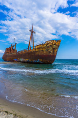 The famous, old and rusty shipwreck Agios Dimitrios in Gythio of Peloponnese in Greece