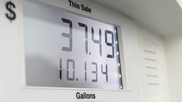 Digital readout at a gas station pump.
