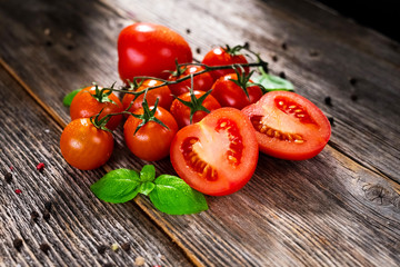 Fresh  tomatoes on rustic background