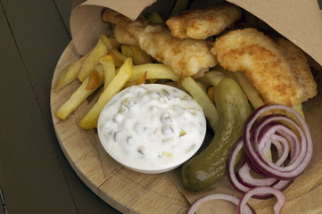 The fish and chips. A traditional English dish.