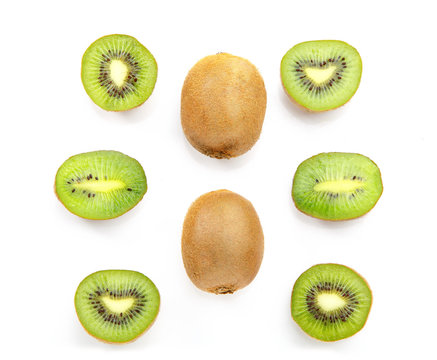Ripe fresh kiwi fruit. Whole and half kiwifruit isolated on white background.