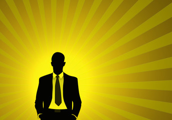 Hombre con corbata, fondo amarillo, iluminado, rayos, silueta