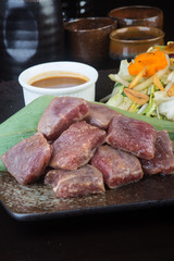 japanese cuisine. beef cube on the background