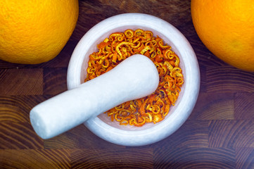 White marble mortar with the orange zest