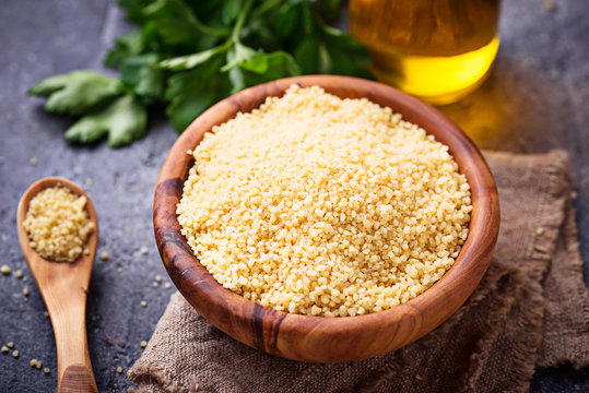 Couscous Grain In Wooden Bowl 