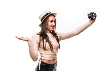 Tourist Woman blogger in hat record herself on camera and talking on video blog on white background.
