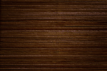 Texture of wood made of ice cream sticks. Side view.