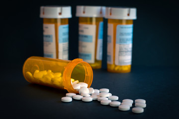 Open Bottle of Prescription Drug with space for text