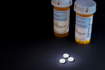 Open Bottle of Prescription Drug with space for text