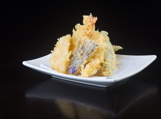 japanese cuisine. tempura seafood on the background
