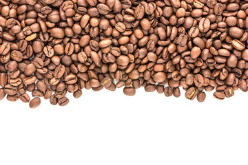 Grains of coffee scattered on the top of the photo. Roasted coffee beans close-up.